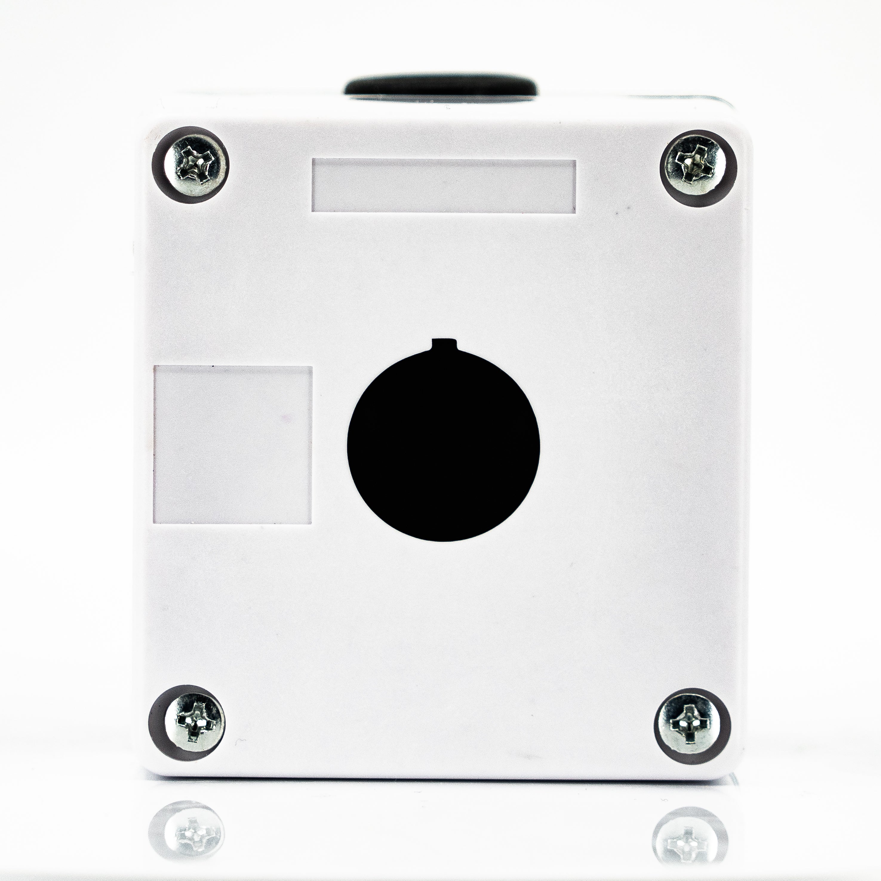 Caja en material de plastico, 1 orificio, para unidades de 22mm, base negra cubierta blanca