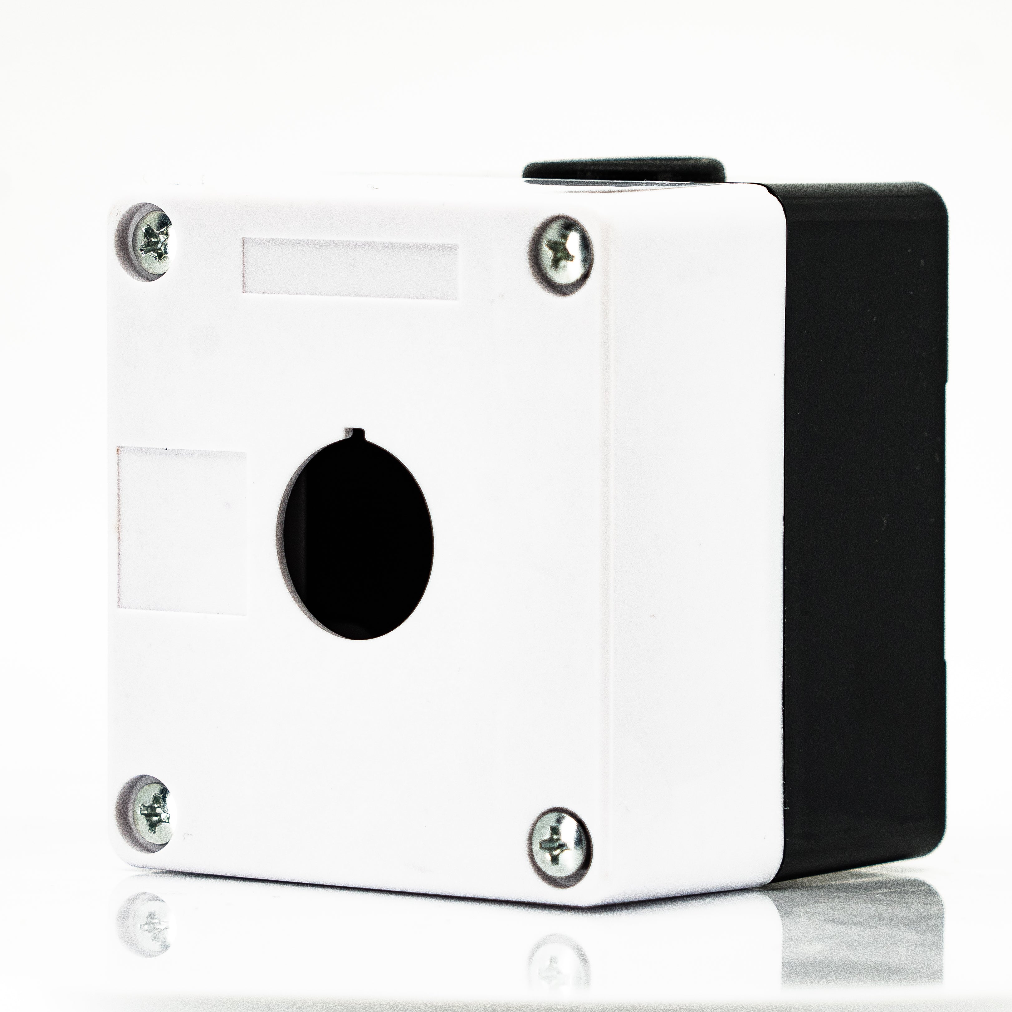 Caja en material de plastico, 1 orificio, para unidades de 22mm, base negra cubierta blanca